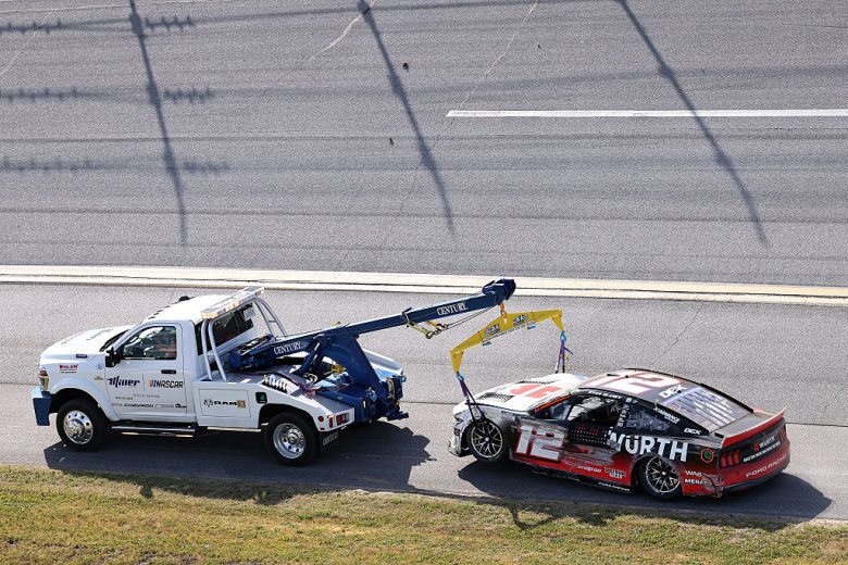 The No. 12 Ford gets towed following a NASCAR Cup Series wreck at Talladega Superspeedway.