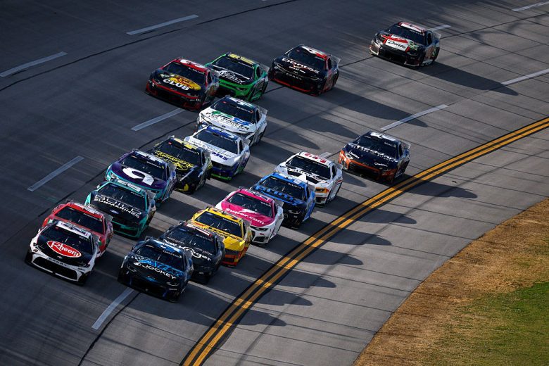 NASCAR Cup Series cars race at Talladega Superspeedway.