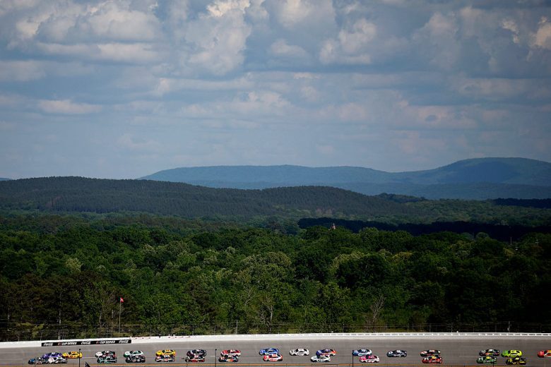 NASCAR Cup Series cars race at Talladega Superspeedway.