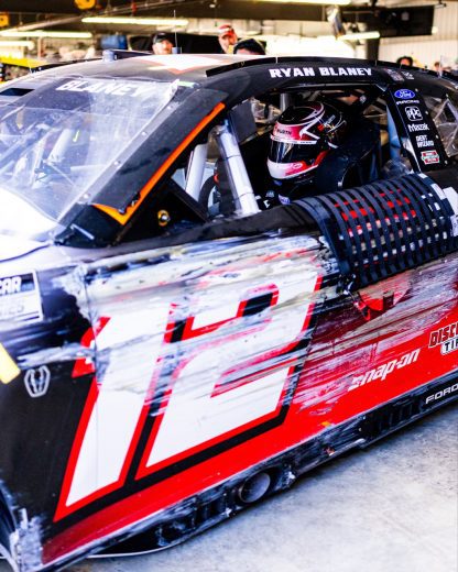 The No. 12 Ford shows damage following a NASCAR Cup Series wreck at Talladega Superspeedway.