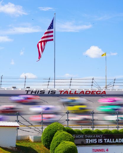 NASCAR Cup Series cars race at Talladega Superspeedway.