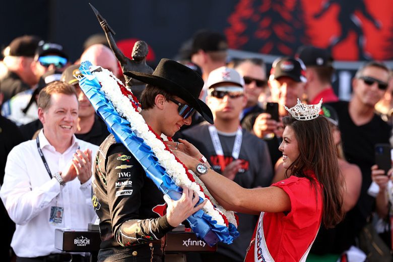 Carson Hocevar is presented his victory wreath at Talladega Superspeedway.
