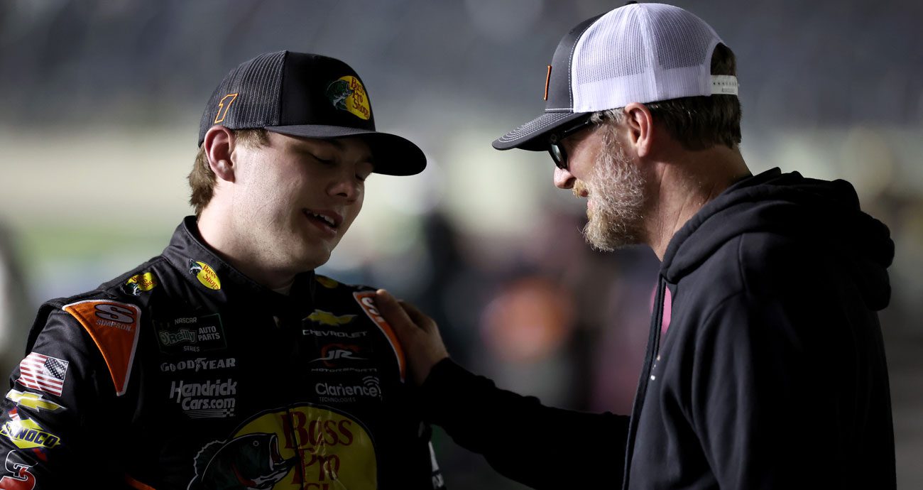 Carson Kvapil (L) and Dale Earnhardt Jr. (R) talk.