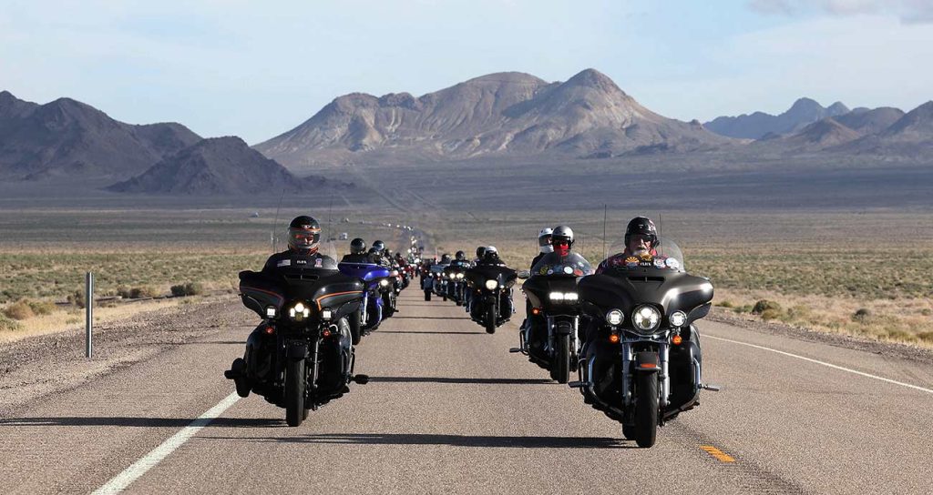 Riders hit the road with a glorious mountain backdrop in the Kyle Petty Charity Ride.