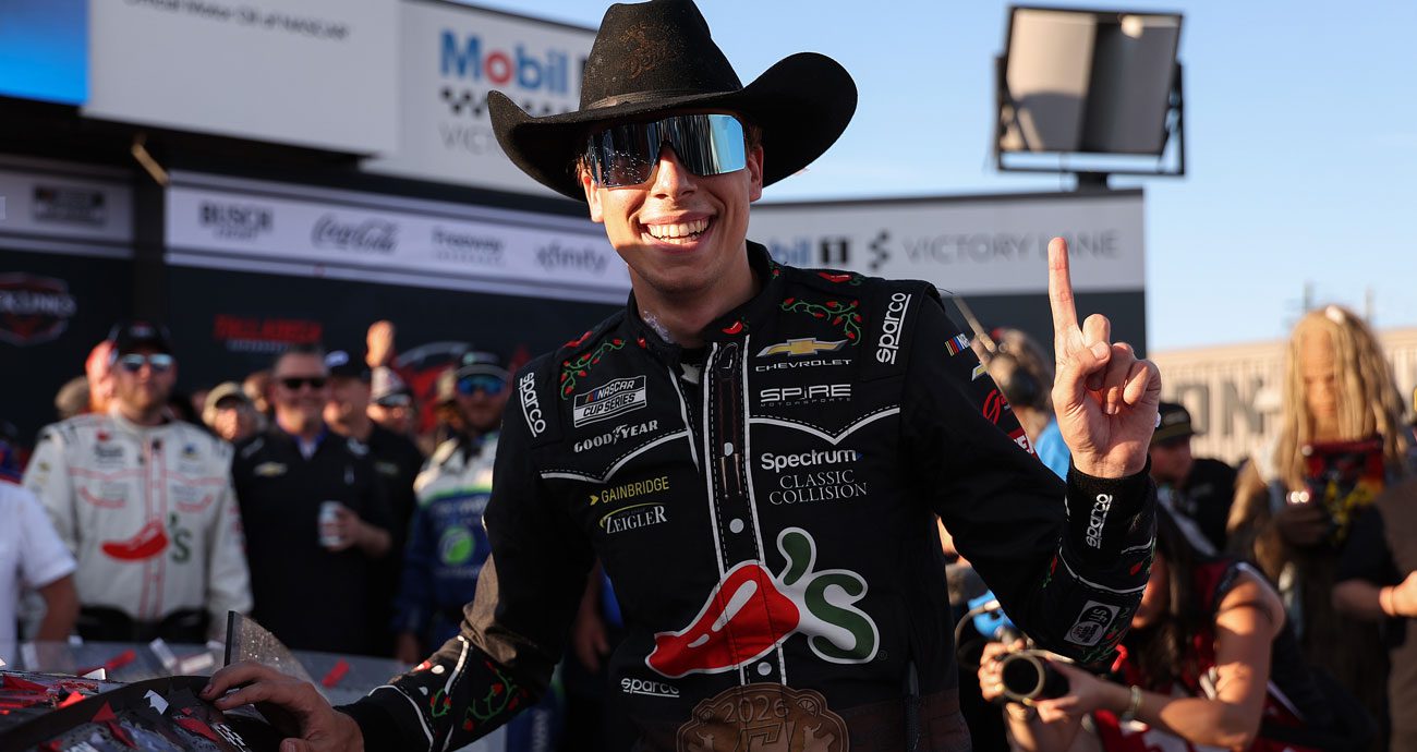 Carson Hocevar poses for a photo in Victory Lane at Talladega Superspeedway.