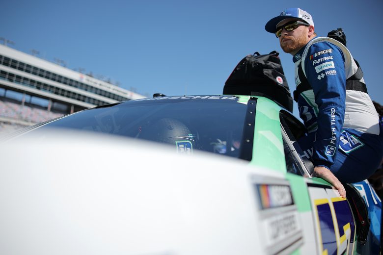 FORT WORTH, TEXAS - APRIL 13: Chris Buescher, driver of the #17 Fifth Third Bank Ford, enters his car during qualifying for the NASCAR Cup Series AutoTrader EchoPark Automotive 400 at Texas Motor Speedway on April 13, 2024 in Fort Worth, Texas. (