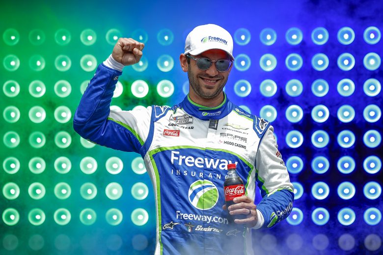TALLADEGA, ALABAMA - APRIL 26: Daniel Suarez, driver of the #7 Freeway Insurance Chevrolet, waves to fans as he walks onstage during driver intros prior to the NASCAR Cup Series Jack Link's 500 at Talladega Superspeedway on April 26, 2026 in Talladega, Alabama. (