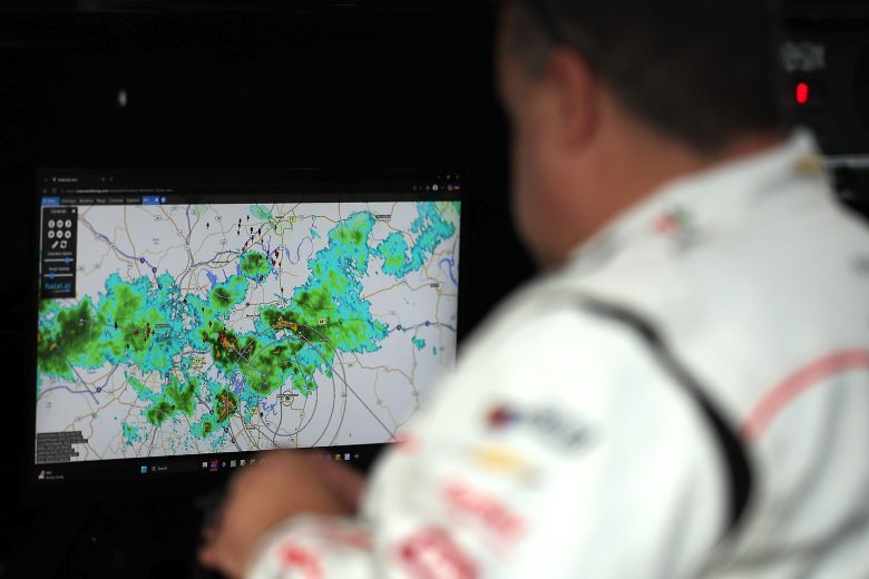 View of crew member looking at the weather radar.