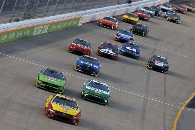 View of Cup Series cars racing at Nashville.