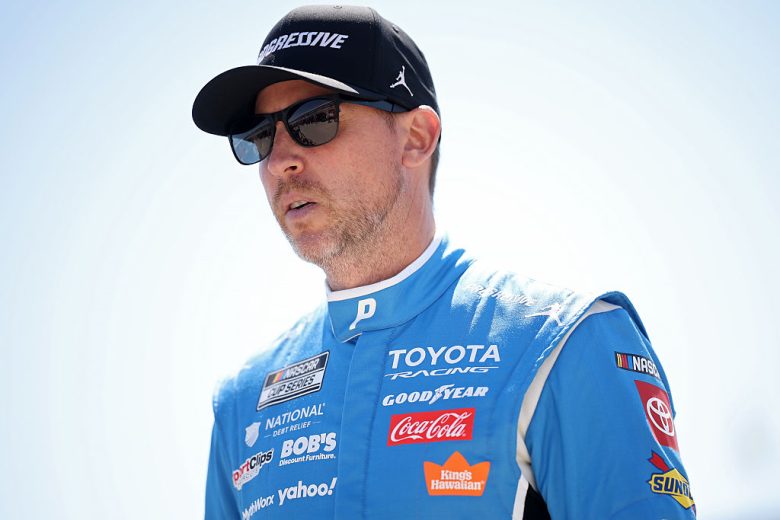 Denny Hamlin looks on.