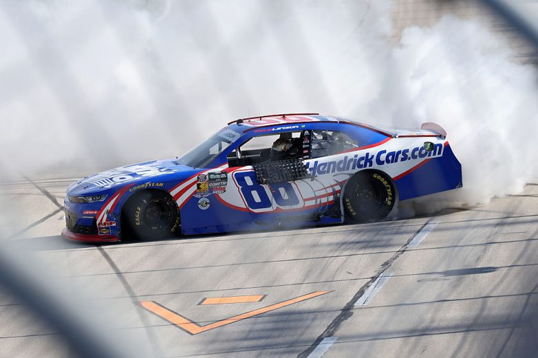 Kyle Larson does a burnout at Texas.