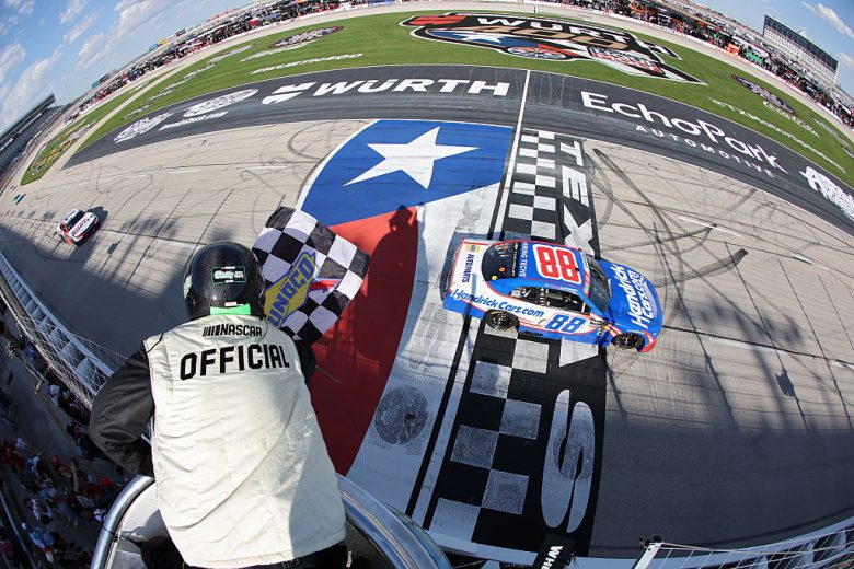 Kyle Larson takes the checkered flag at Texas.