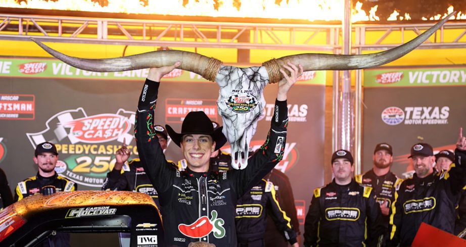 Carson Hocevar celebrates in Victory Lane at Texas.