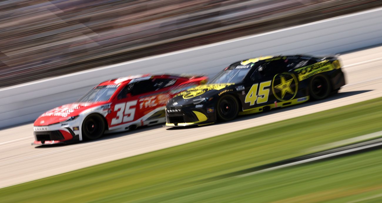 Riley Herbst and Tyler Reddick race at Texas.