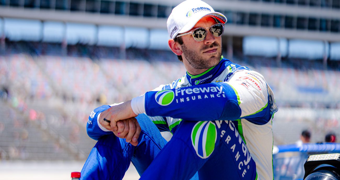 Daniel Suárez sits on pit wall at Texas.