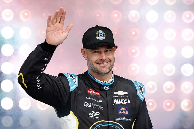Shane van Gisbergen waves to fans.
