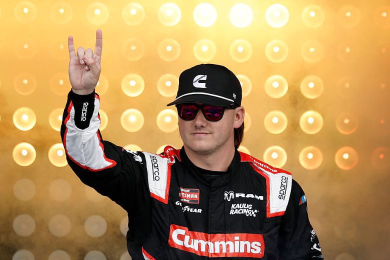 Brenden Queen waves to fans.