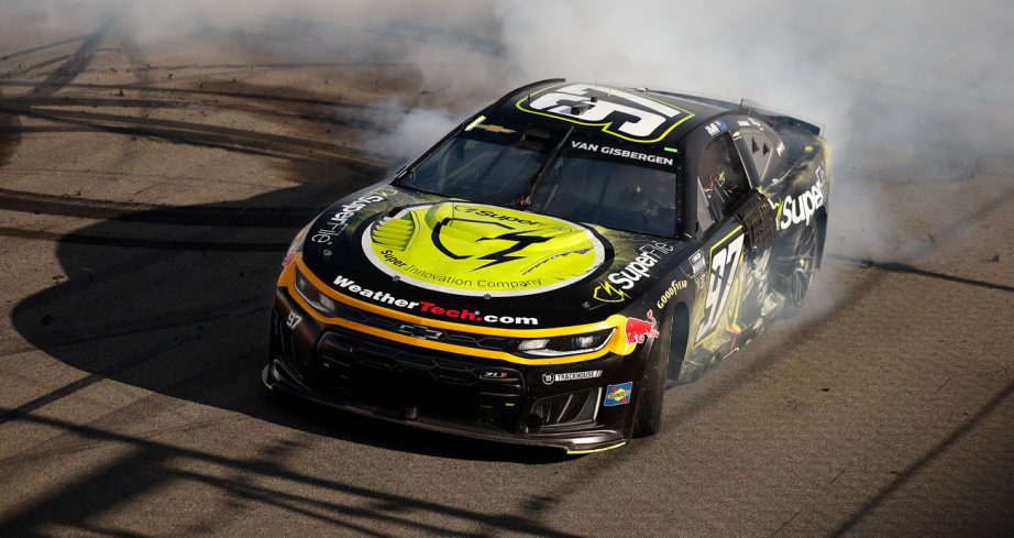 Shane van Gisbergen does a celebratory burnout in the No. 97 Trackhouse Racing Chevrolet following his NASCAR Cup Series win at Watkins Glen International.