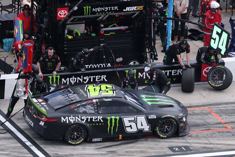 Ty Gibbs' No. 54 Joe Gibbs Racing Toyota gets tended to on pit road.