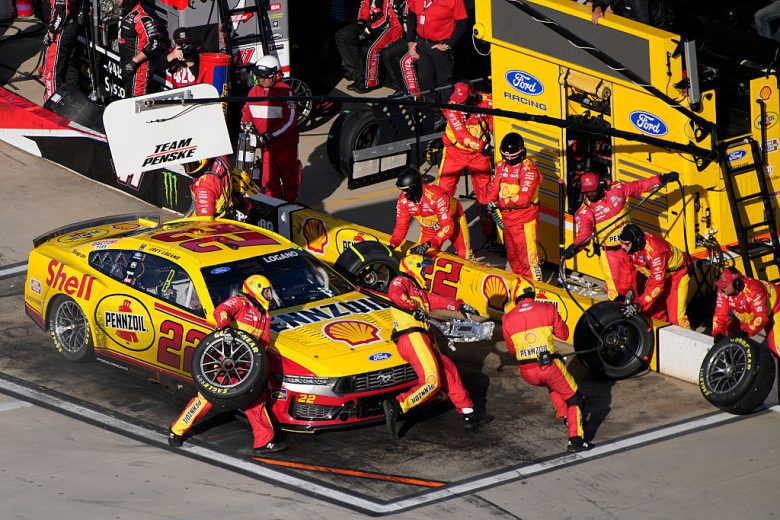Joey Logano's No. 22 Team Penske Ford gets tended to on pit road.