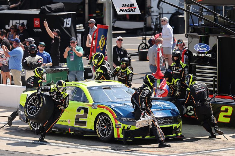 Austin Cindric's No. 2 Team Penske Ford gets tended to on pit road.
