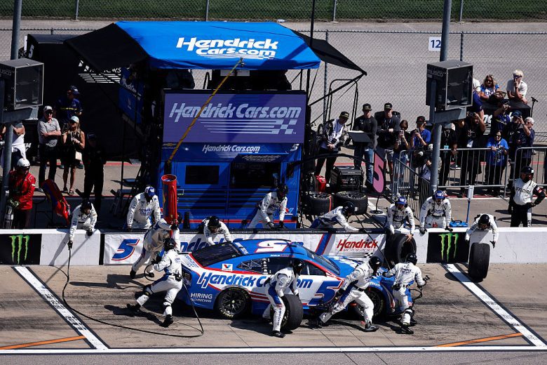 Kyle Larson's No. 5 Hendrick Motorsports Chevrolet gets tended to on pit road.