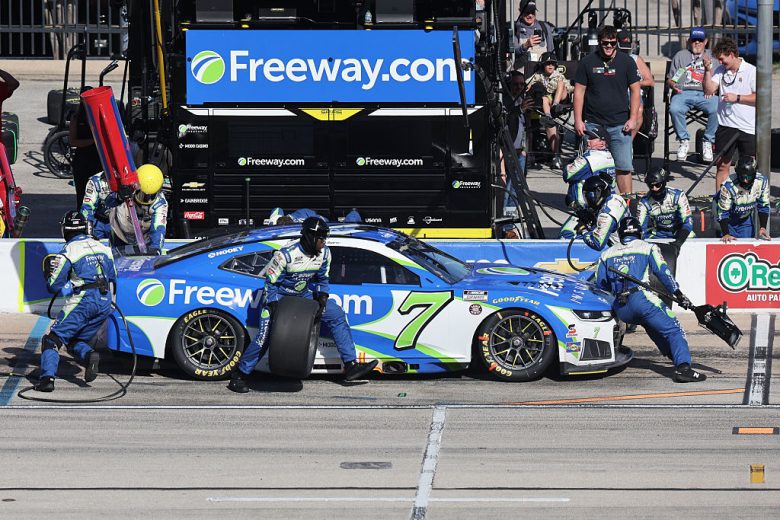 Daniel Suarez's No. 7 Spire Motorsports Chevrolet gets tended to on pit road.