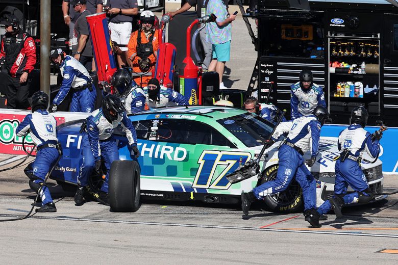 Chris Buescher's No. 17 RFK Racing Ford gets tended to on pit road.