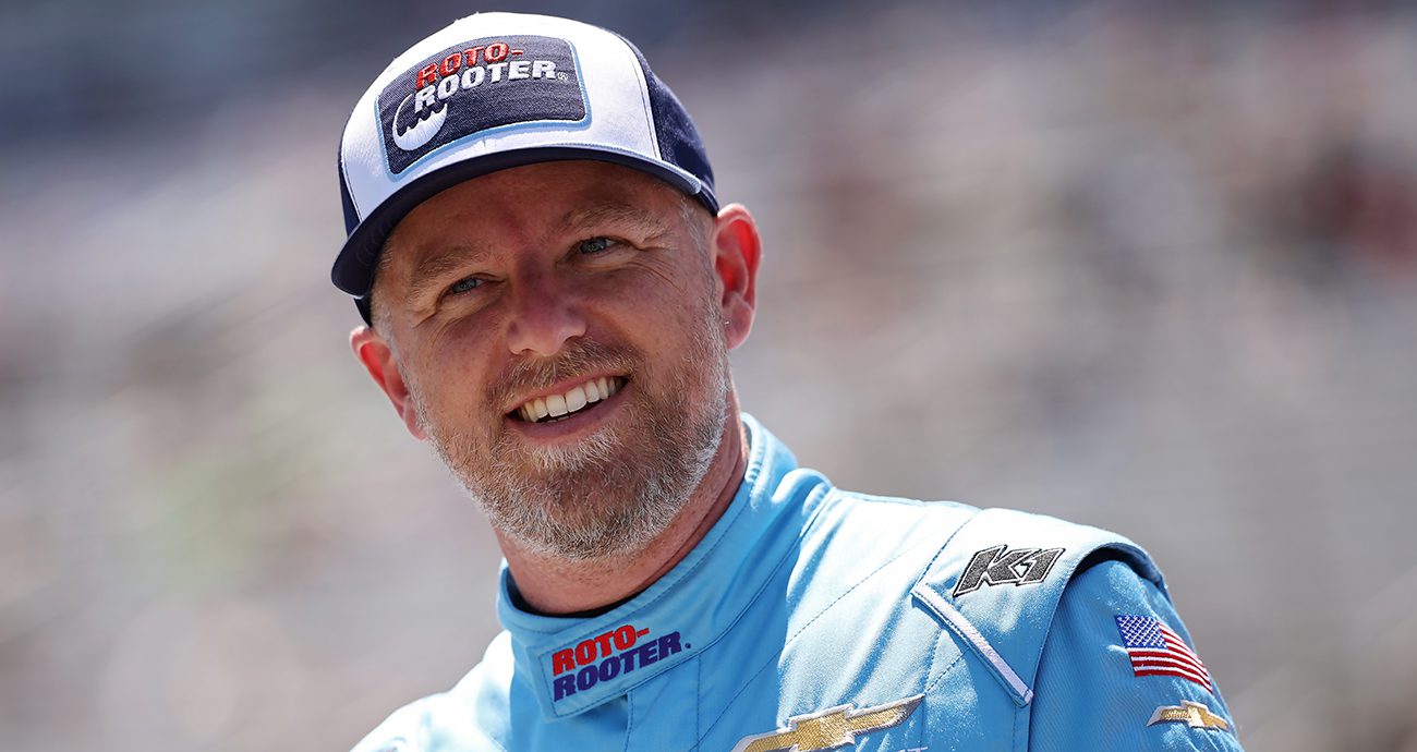 Jastin Allgaier, driver of the #7 Roto-Rooter Chevrolet, looks on from the grid during the NASCAR O'Reilly Auto Parts Series Andy's Frozen Custard 340 at Texas Motor Speedway on May 02, 2026 in Fort Worth, Texas.
