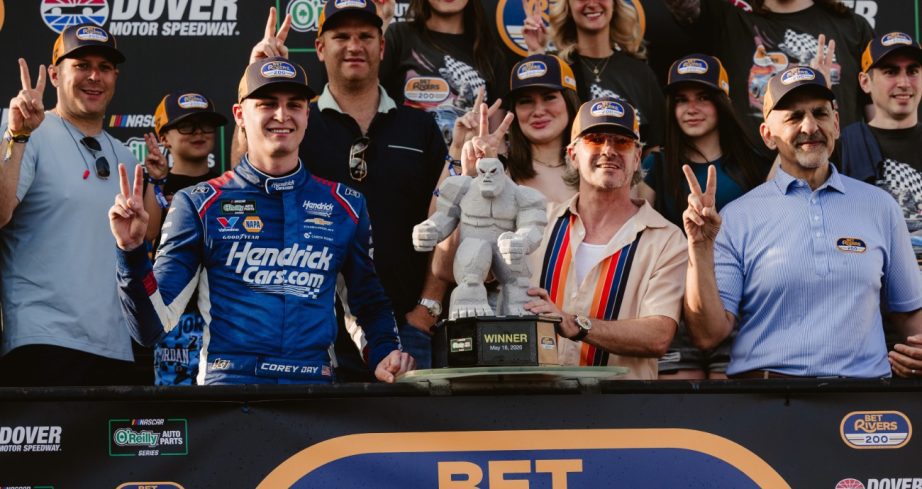 Day poses with trophy.