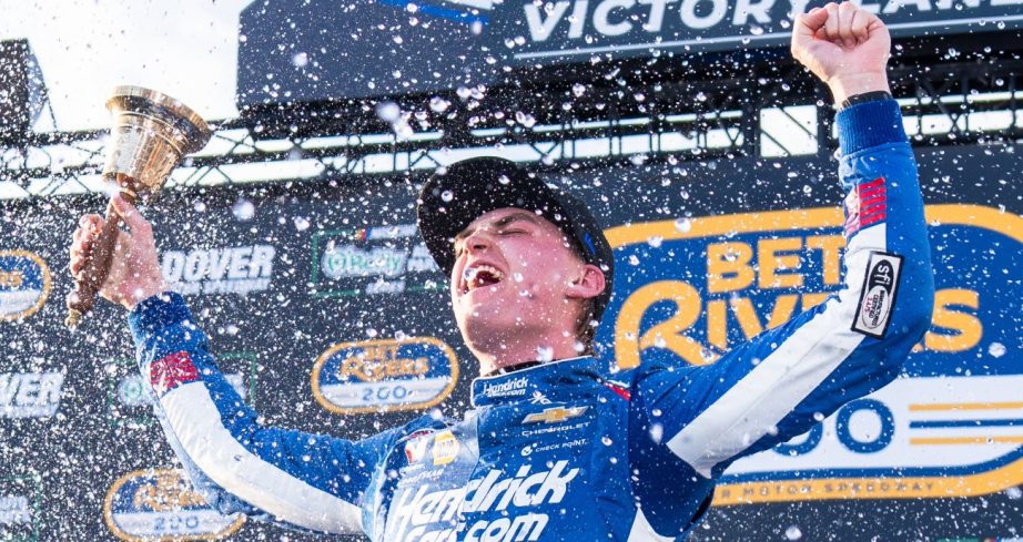 Day celebrates in VIctory Lane.