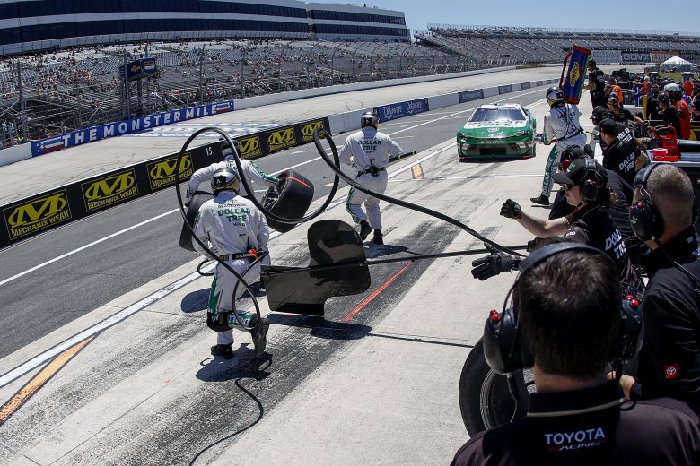 Pit Crew waits for car.