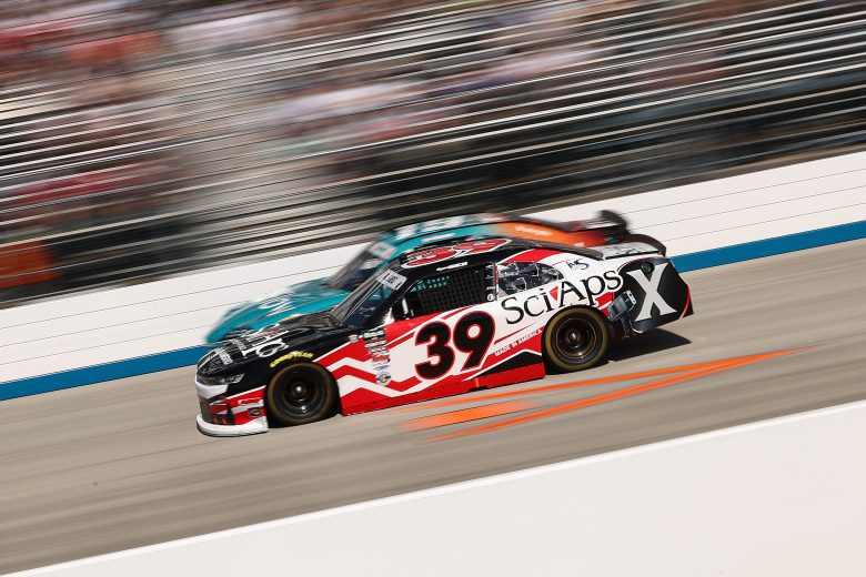 Ryan Sieg races Brent Crews.