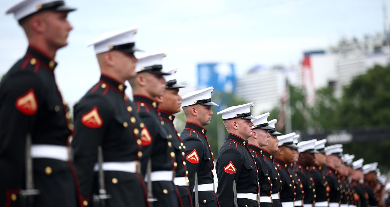 military members line up at charlotte motor speedway
