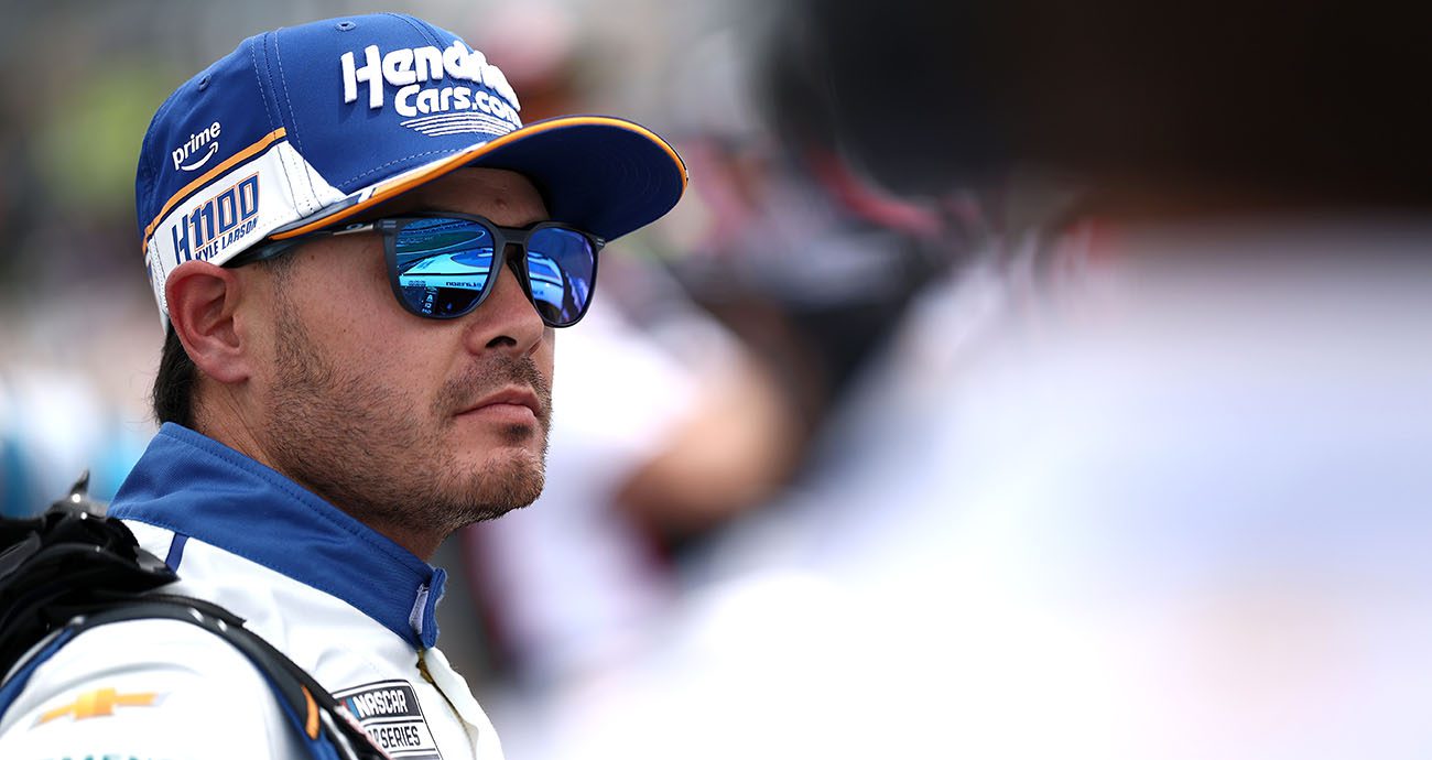 kyle larson looks on during his double attempt