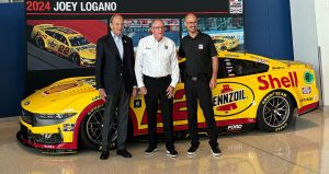 joey logano in front of his no. 22 team penske ford that won the 2024 cup series championship