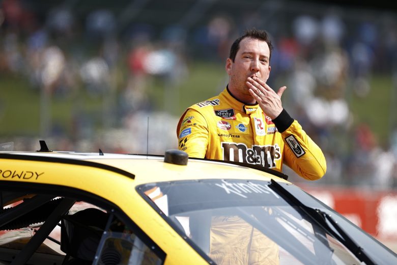 Kyle Busch blows a kiss to fans after winning at Road America on July 3, 2021, in Elkhart Lake, Wisconsin.