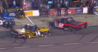 Retzlaff spins on pit road after contact from Tyrrell