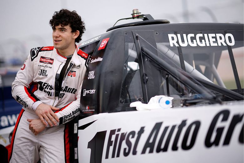 Gio Ruggiero looks on.