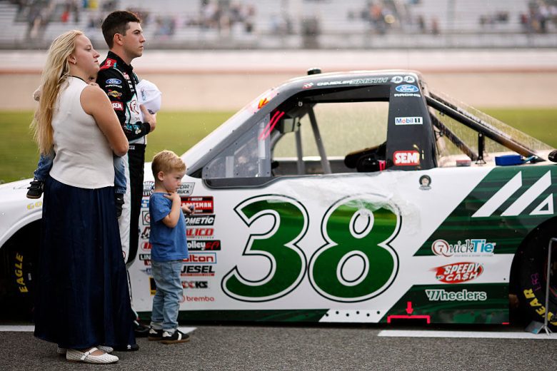 Chandler Smith stands with his family.