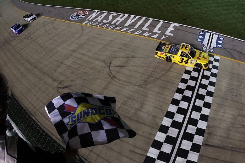 Layne Riggs takes the checkered flag at Nashville.