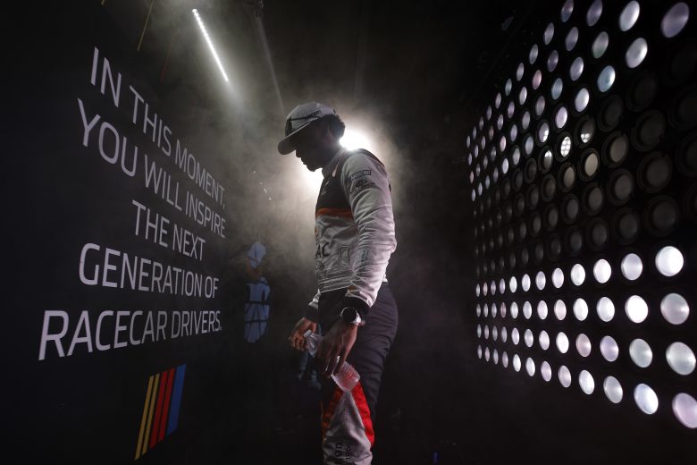 Lavar Scott waits backstage during driver intros for the O'Reilly Auto Parts Series race at Nashville.