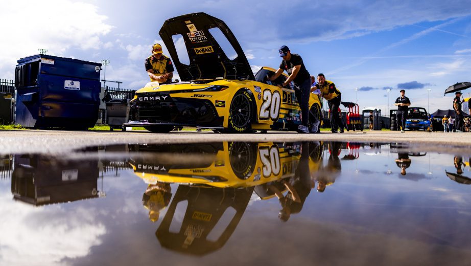 The No. 20 Joe Gibbs Racing Toyota gets pushed in the garage area at Nashville.