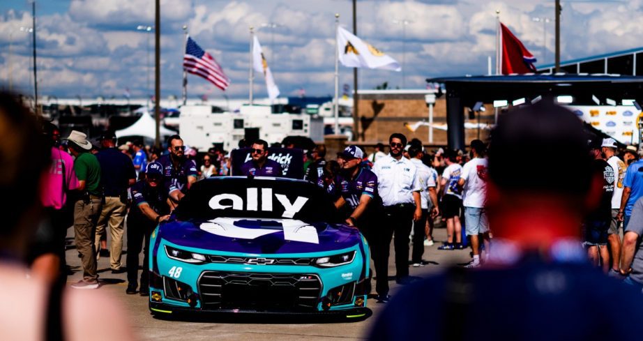Cup Series car gets pushed through the garage area.