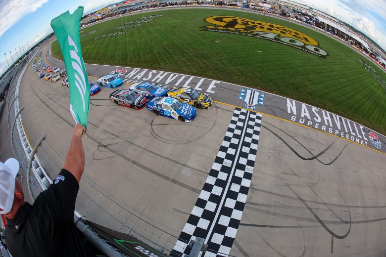 View of the green flag waving as the O'Reilly Auto Parts Series race gets underway at Nashville.