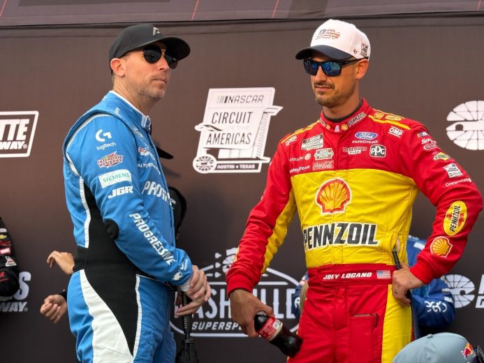 Denny Hamlin talks with Joey Logano.