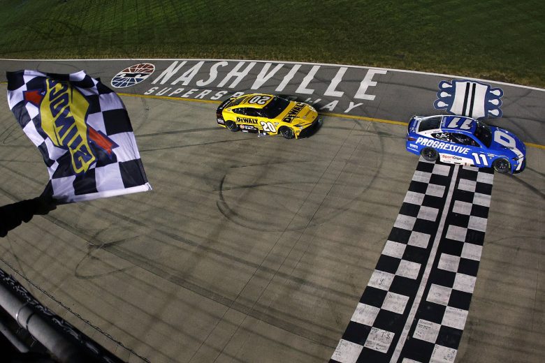 Hamlin crosses the start finish line first at Nashville.