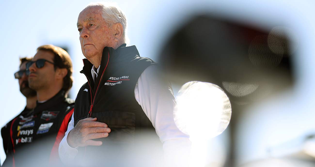 Roger Penske stands on Daytona International Speedway's pit road for pre-race ceremonies at the Rolex 24 in 2025.