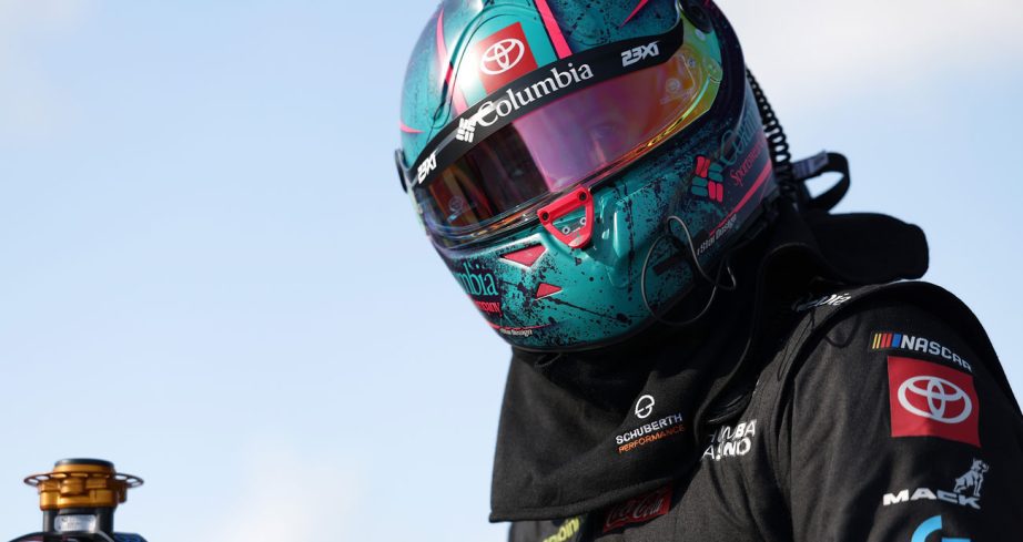 Bubba Wallace climbs into his car at Michigan.