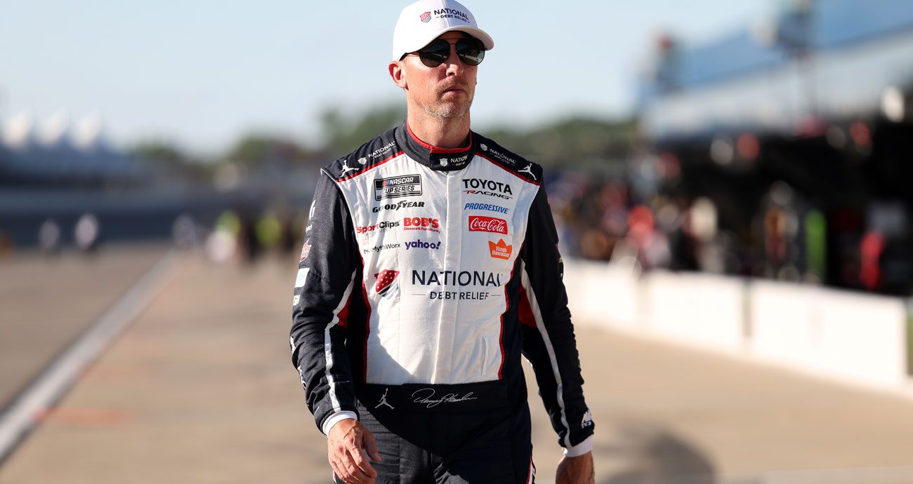 Denny Hamlin walks at Michigan.